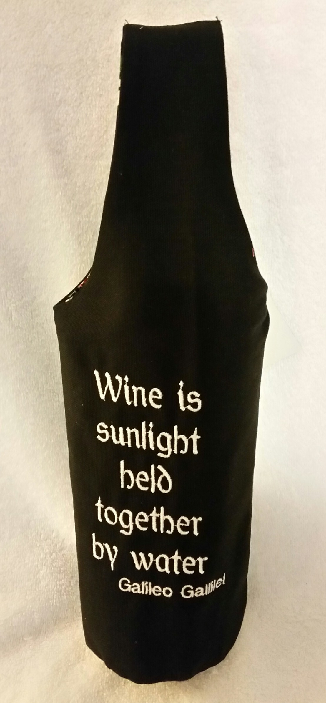 Wine is sunlight quote by Galileo Beverage Bag. 